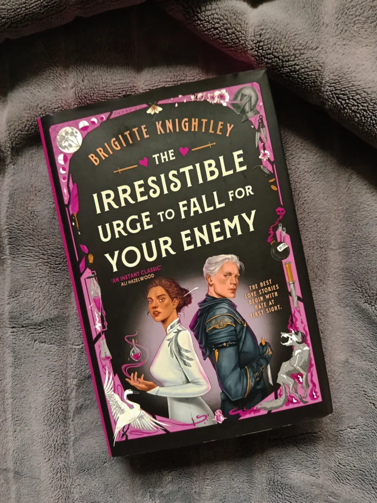 A photo of a hardback copy of The Irresistible Urge to Fall For Your Enemy by Brigitte Knightley