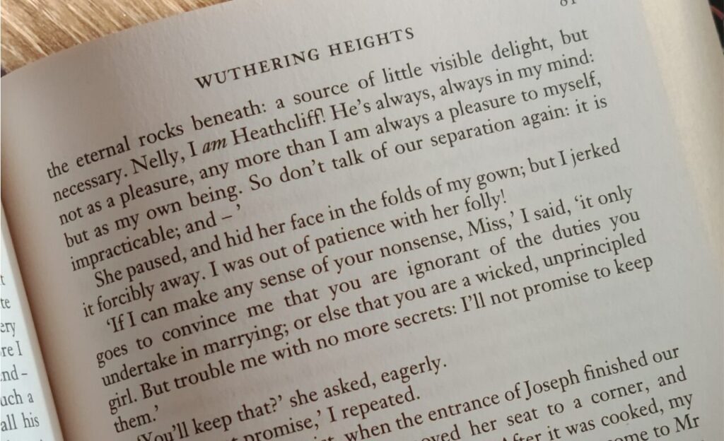 a photo of a page from wuthering heights where cathy says that she is Heathcliff, he is always on her mind, not always as a pleasure because she is not always a pleasure to herself, but as her own being, and she will not be separated from Heathcliff at all