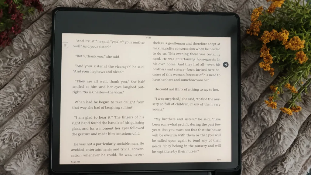A photo of a kindle scribe in two column reading mode, turned horisontally, to illustrate that it can be used for reading like a physical book