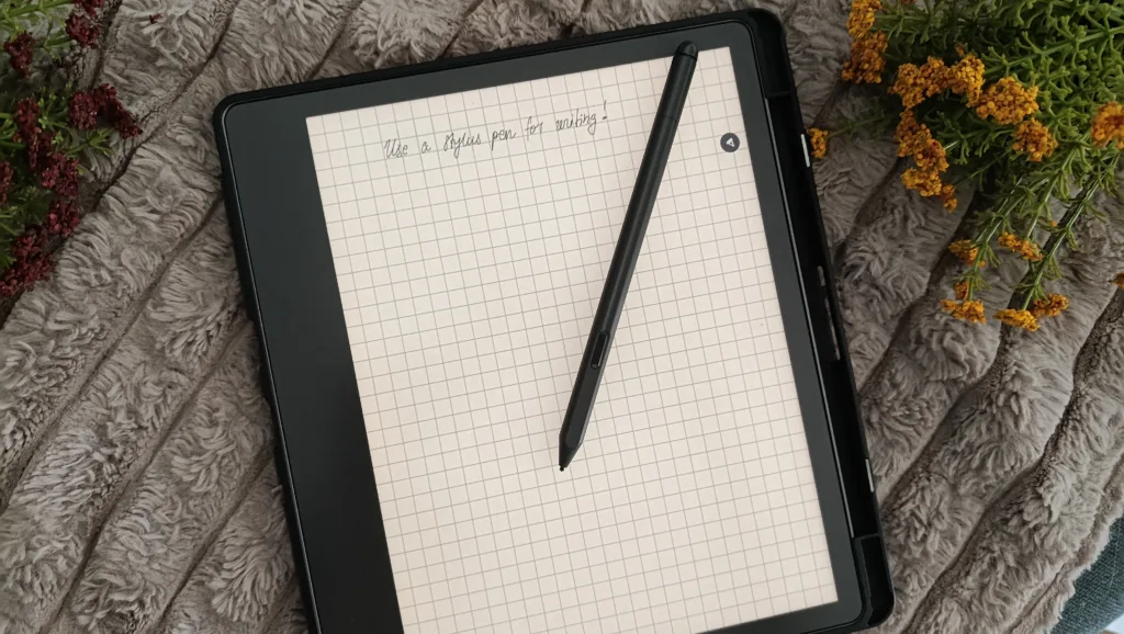 A photo of writing on a kindle scribe to illustrate how the stylus is used and what it looks like.